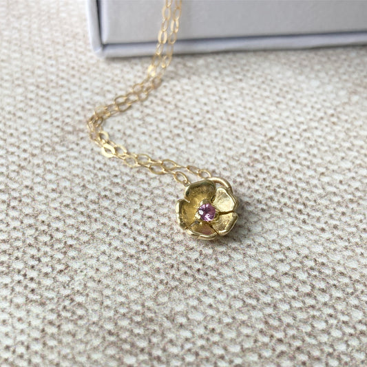 9ct gold flower pendant with sapphire