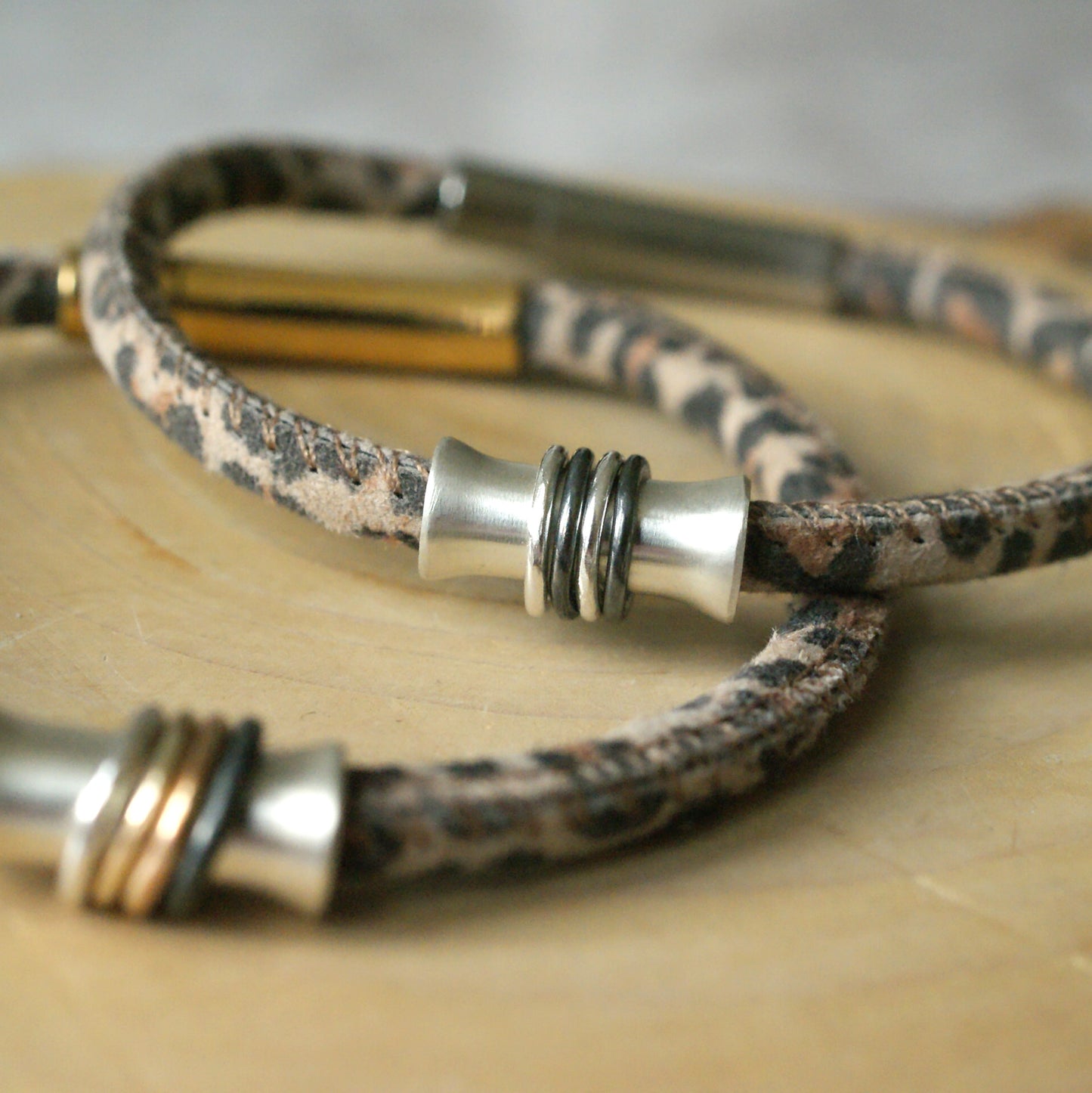 Leopard print leather bracelet with rings